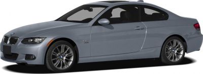 Side profile of a coupe with alloy wheels and a sunroof