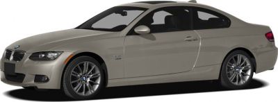 Silver BMW 3 Series Coupe E92 side profile with alloy wheels