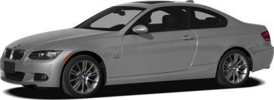 Silver coupe side profile with aerodynamic shape and alloy wheels
