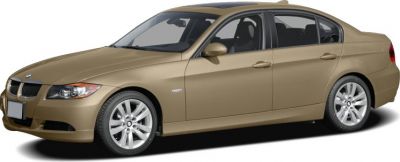 Side profile of a beige sedan with alloy wheels and classic BMW front design