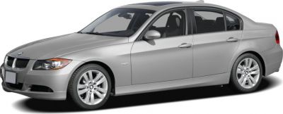 Silver four-door sedan with alloy wheels, side profile view