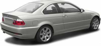 Silver 2-door coupe rear side view with alloy wheels and facelift taillights.