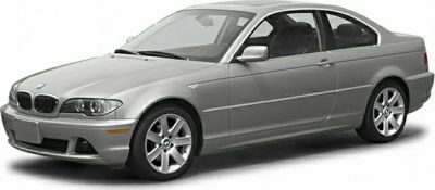 Silver coupe with sleek headlights and alloy wheels