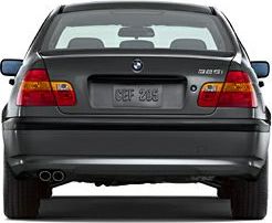 Rear view of sedan with dual exhaust and distinct taillights.