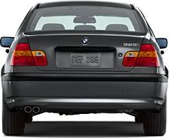 Rear view of a sedan with dual exhaust and distinct taillights