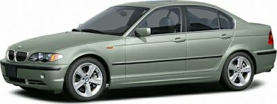 Silver four-door sedan side profile with alloy wheels
