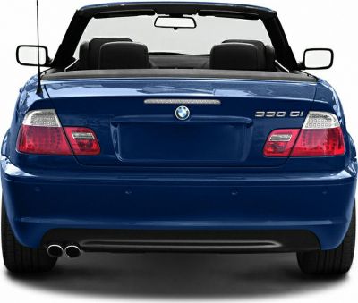Rear view of a blue convertible with dual exhaust and open roof