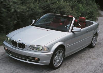 Silver convertible with red interior and iconic E46 front design