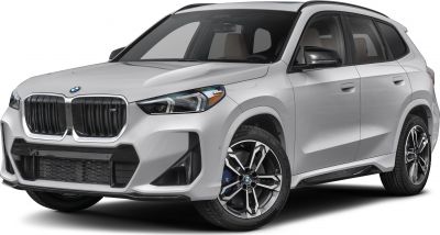 Close-up of front grille, LED headlights, and alloy wheels