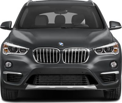 Close-up of BMW kidney grille and LED headlights