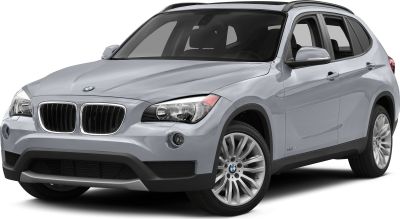 Silver SUV front-side view with headlights and alloy wheels