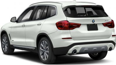 Rear side view, tail lights, dual exhaust, white SUV