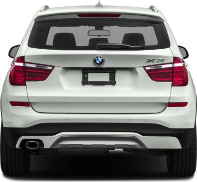 Rear view of SUV showing taillights, rear wiper, and exhaust pipe