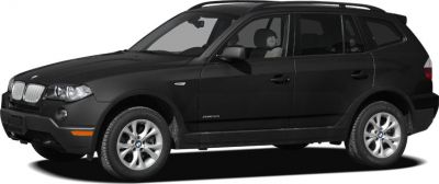 Black BMW SUV side profile with distinct mid-size design and alloy wheels.