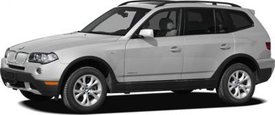 Side profile of a mid-2000s SUV with alloy wheels and roof rails