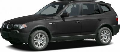 Front side view of a black SUV with alloy wheels and roof rails