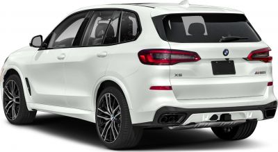 Rear view of white SUV with quad exhaust and modern taillights