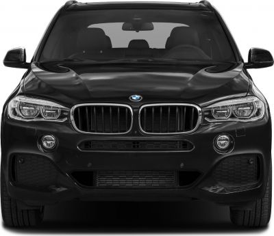 Front view showcasing grille and headlight design