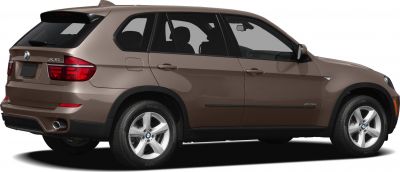 Side and rear view of mid-size SUV with alloy wheels and rear spoiler