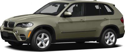 Side profile view of SUV with alloy wheels and body-color trim