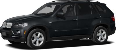 Black SUV with prominent side profile and distinct alloy wheels