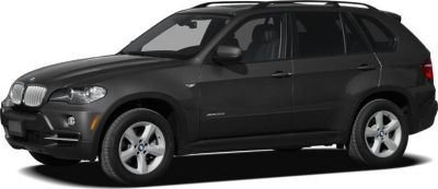 Black SUV side profile with alloy wheels and roof rails