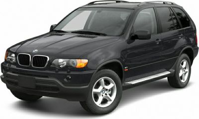 Black SUV showing front side view with alloy wheels and roof rails