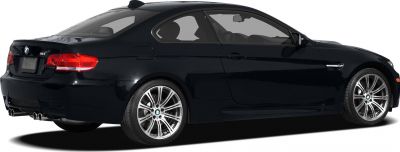 Rear side view of black coupe with quad exhaust and alloy wheels