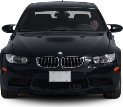 Front view of a performance sedan with kidney grille and aggressive headlights