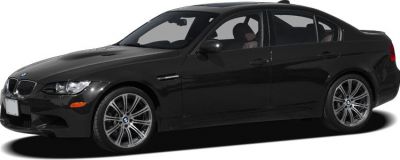 Black sedan with alloy wheels in side profile