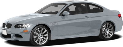 Front side view of a coupe with prominent alloy wheels and sleek aerodynamic shape.