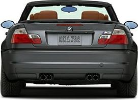 Rear view of a convertible with quad exhausts and open roof