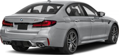 Rear view with quad exhausts, sleek taillights, and alloy wheels