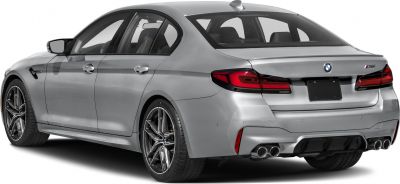 Rear view of sporty sedan with quad exhausts and LED tail lights