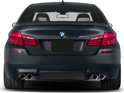 Rear view with quad exhaust tips and distinctive taillights