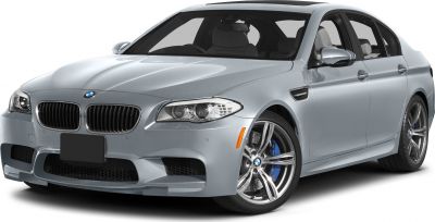 Front side view of silver sedan with distinctive grille and sporty alloy wheels