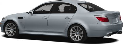 Silver sedan side and rear view with alloy wheels