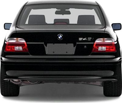 Rear view of a luxury sedan with taillights and emblem