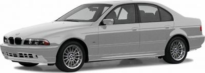 Side profile of a facelift sedan with multi-spoke alloy wheels and sleek body lines