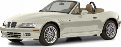 Convertible roadster with sporty alloy wheels and beige leather interior