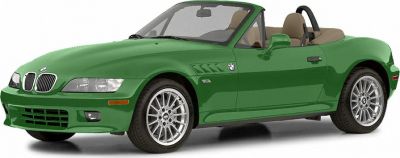Green convertible roadster with beige interior and sporty wheels