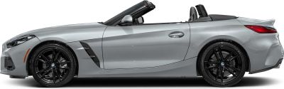 Convertible sportscar side profile with black alloy wheels and open roof