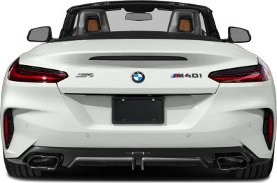 Rear view of convertible with distinctive taillights and dual exhausts