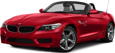 Front angled view of red convertible with aggressive headlights and alloy wheels