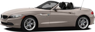 Side profile of convertible roadster with retractable roof and sporty alloy wheels.