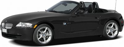 Side view of a convertible roadster with five-spoke wheels