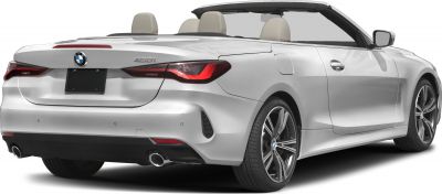Convertible rear view with taillights, dual exhaust, and alloy wheels