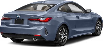 Rear side view of a sleek coupe with modern taillights and alloy wheels