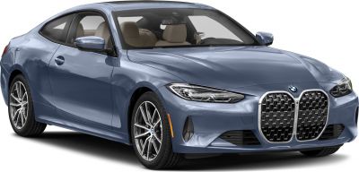 Front side view showcasing large kidney grille and sleek headlights