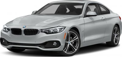 Front view of silver coupe with sleek headlights and alloy wheels